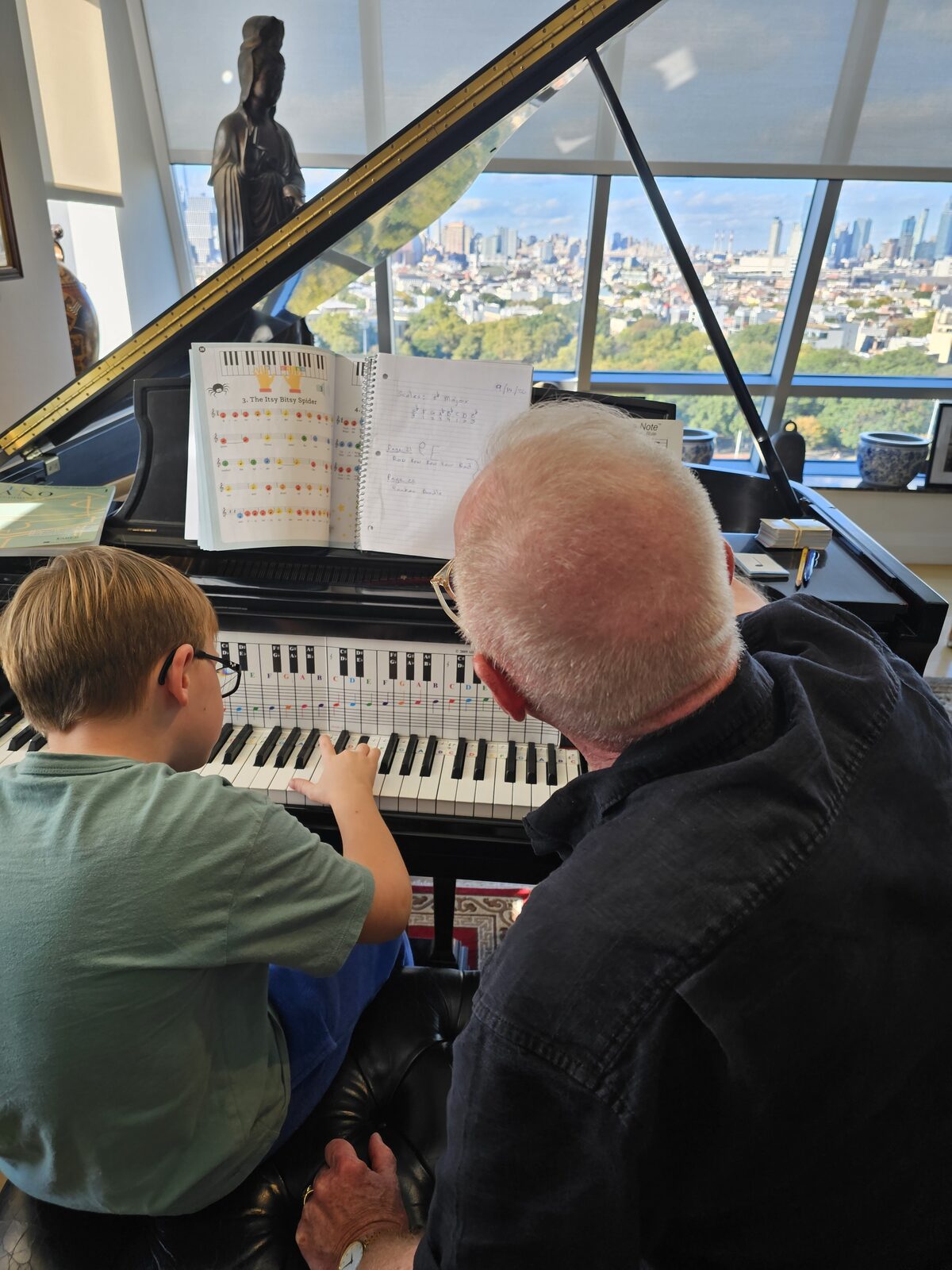 Daniel Teaching Charlie Piano